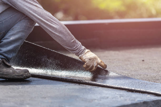 Professional Basement Waterproofing technician working in Fort Lee, NJ